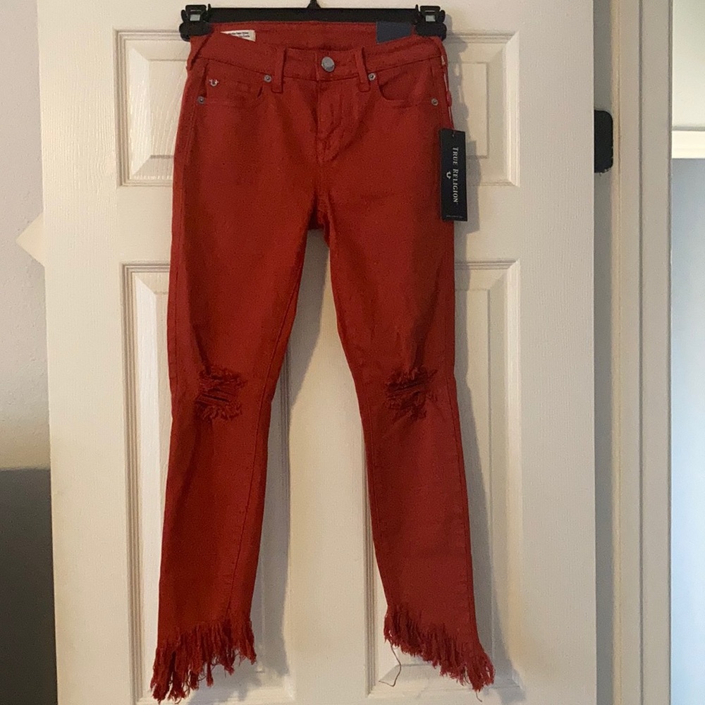 Rust colored True Religion jeans
